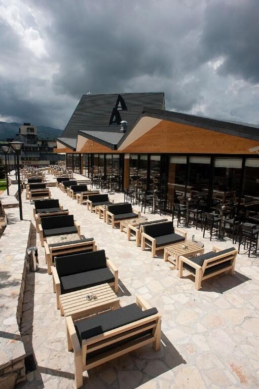 Outdoor terrace with wooden loungers