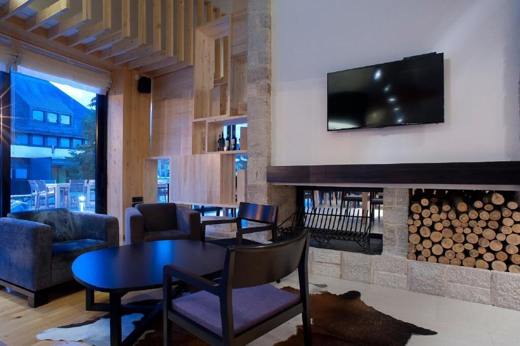 Lobby with fireplace and wood detailing